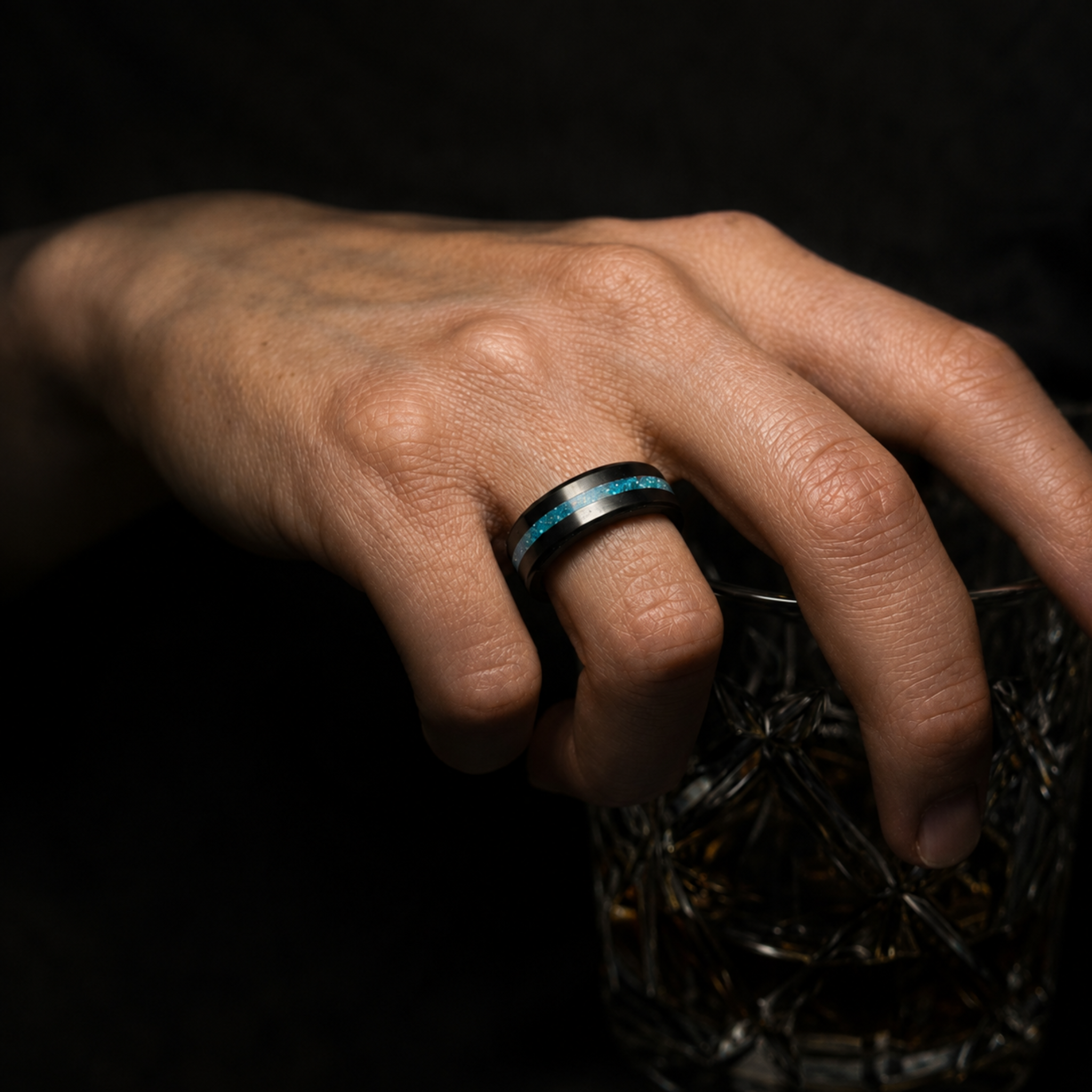 ARES 8mm solid black diamond ring with blue opal inlay worn on hand