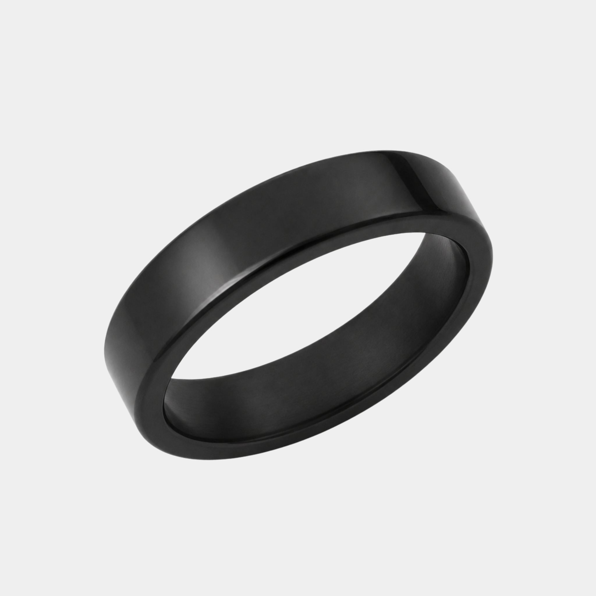 KRATOS 6mm polished solid black diamond wedding band in a three-quarter studio view